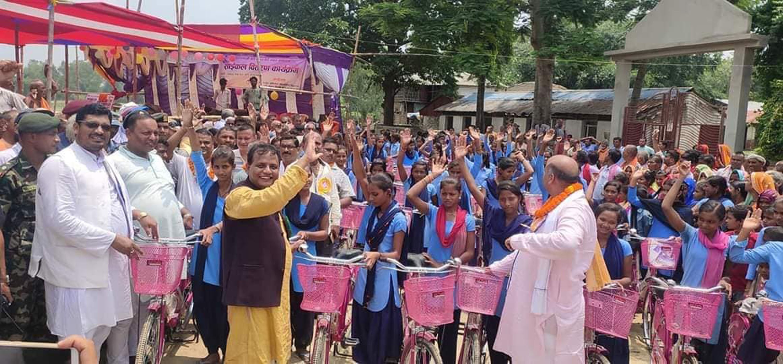 chief-minister-of-province-2-lalbabu-raut-front-yellow-dress-distributes-cycles-to-some-274-girl-students-of-secondary-schools-in-mahottari-district-aug-21
